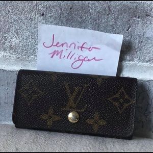 SoldAuthentic Louis Vuitton four key holder